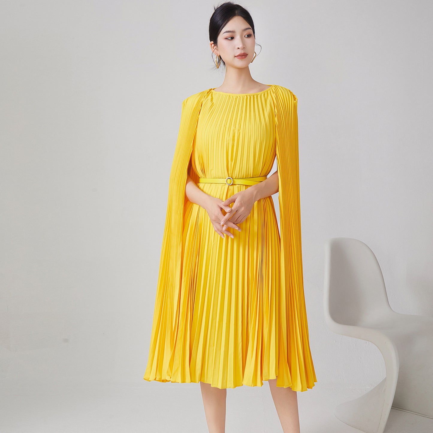 2025 Hot trade pleated dress women's high-end new irregular cloak loose lace-up medium and long dress skirt tide