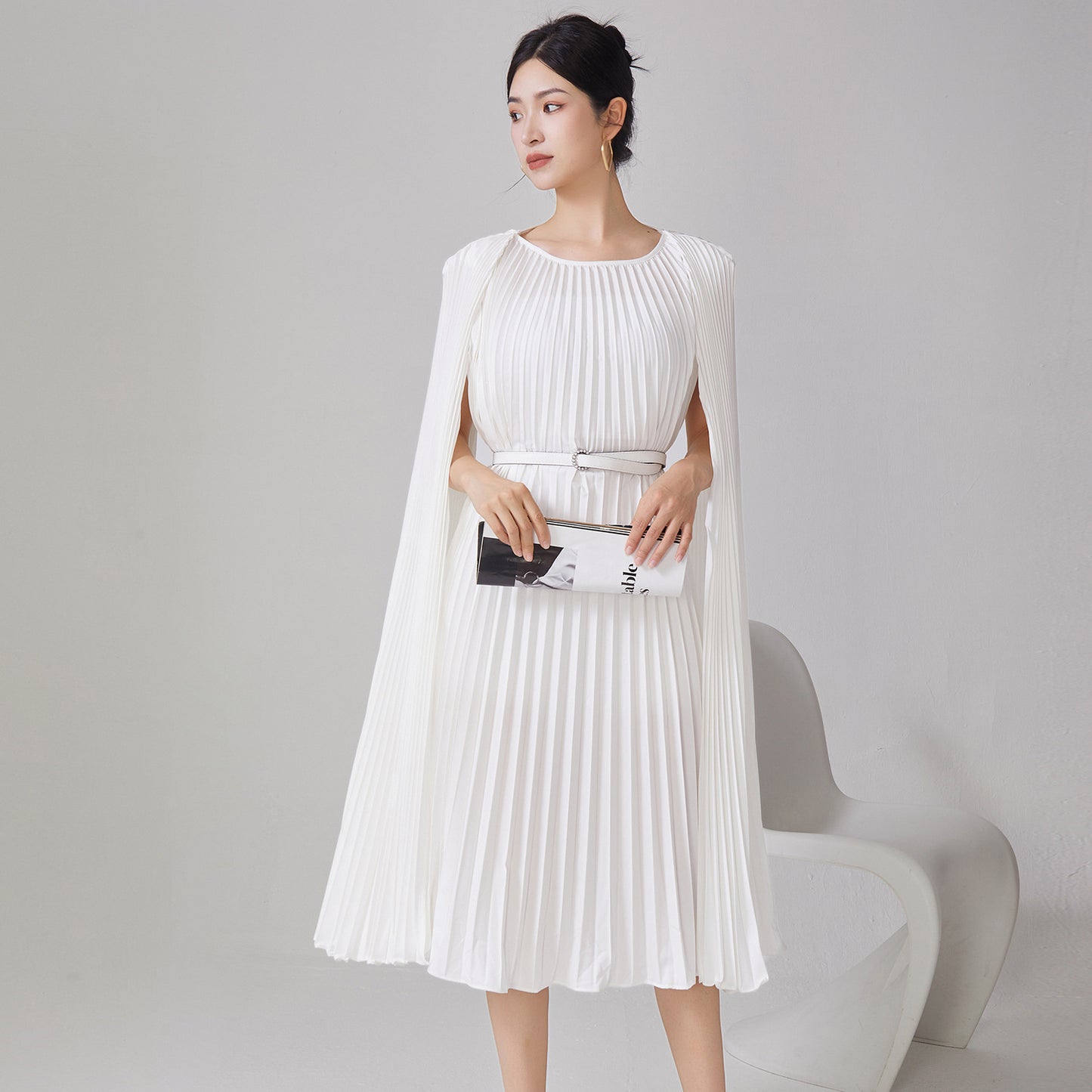 2025 Hot trade pleated dress women's high-end new irregular cloak loose lace-up medium and long dress skirt tide