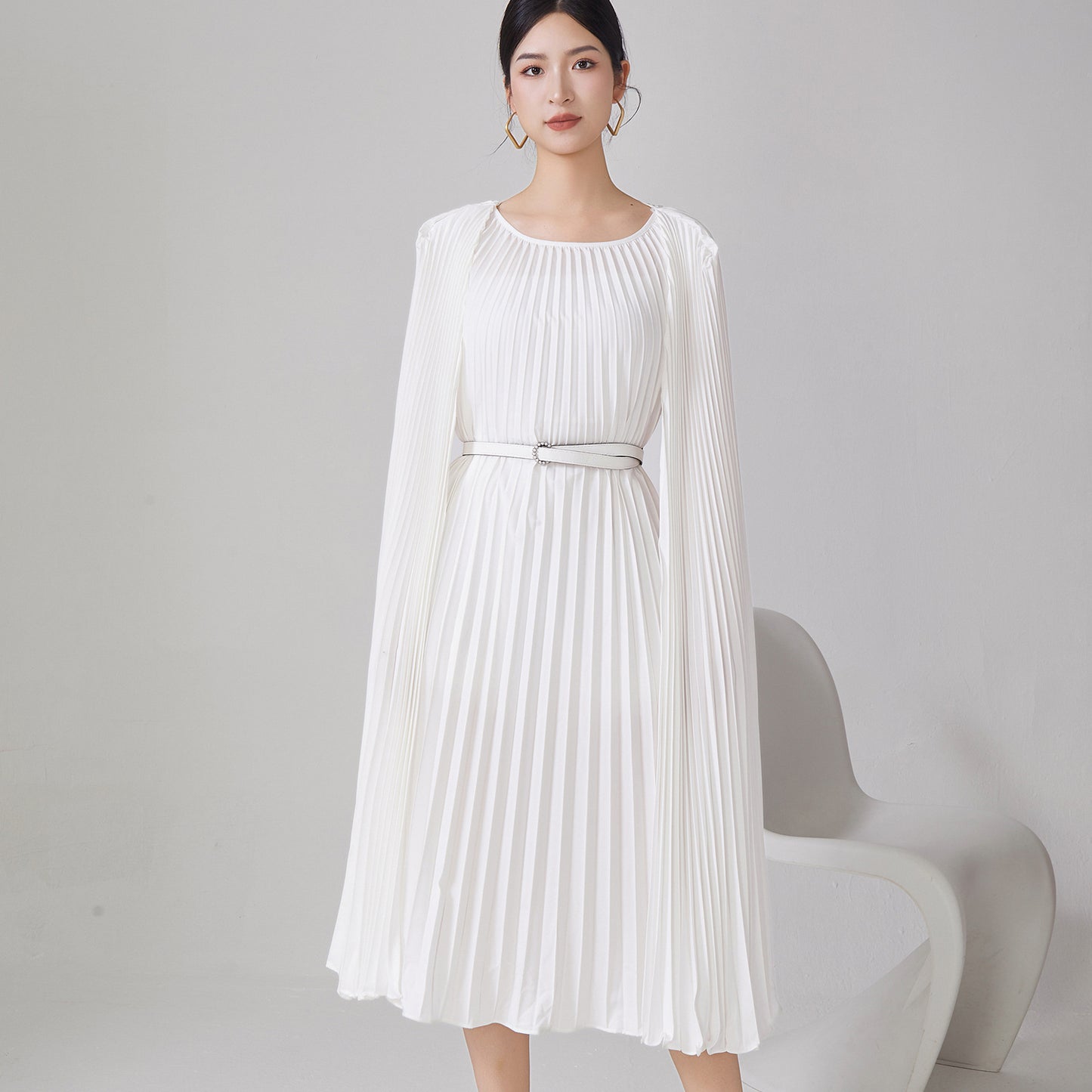 2025 Hot trade pleated dress women's high-end new irregular cloak loose lace-up medium and long dress skirt tide