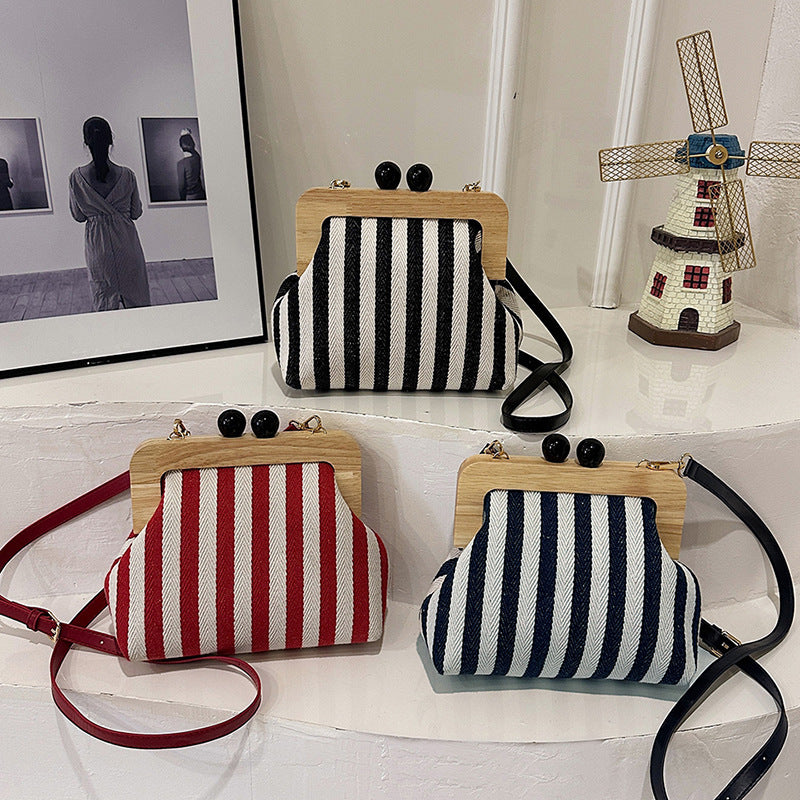 VMTVR 2025  new women's bag striped canvas wooden clip clutch bag fashionable and exquisite Internet celebrity same shoulder messenger bag