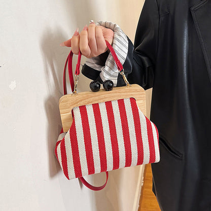 VMTVR 2025  new women's bag striped canvas wooden clip clutch bag fashionable and exquisite Internet celebrity same shoulder messenger bag