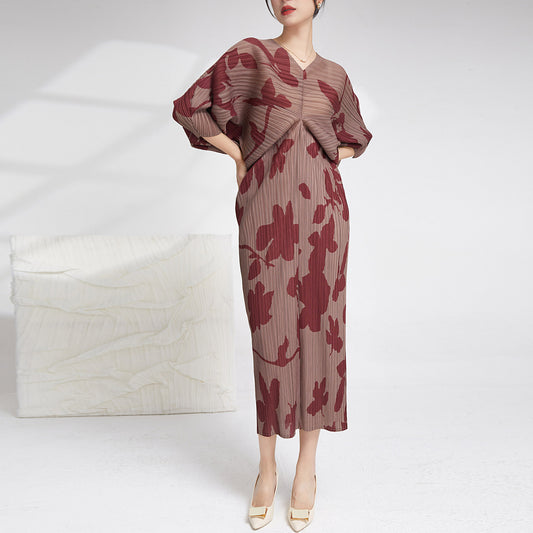 2025 pleated women's dress, high-end sense loose waist one-step skirt, irregular printing temperament long dress Popularan goods